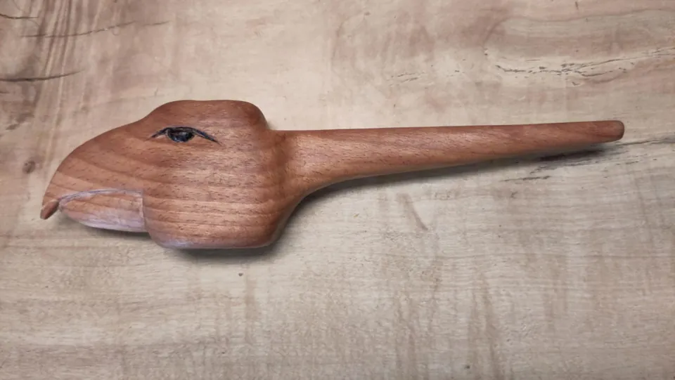 Holzvogel im Profil